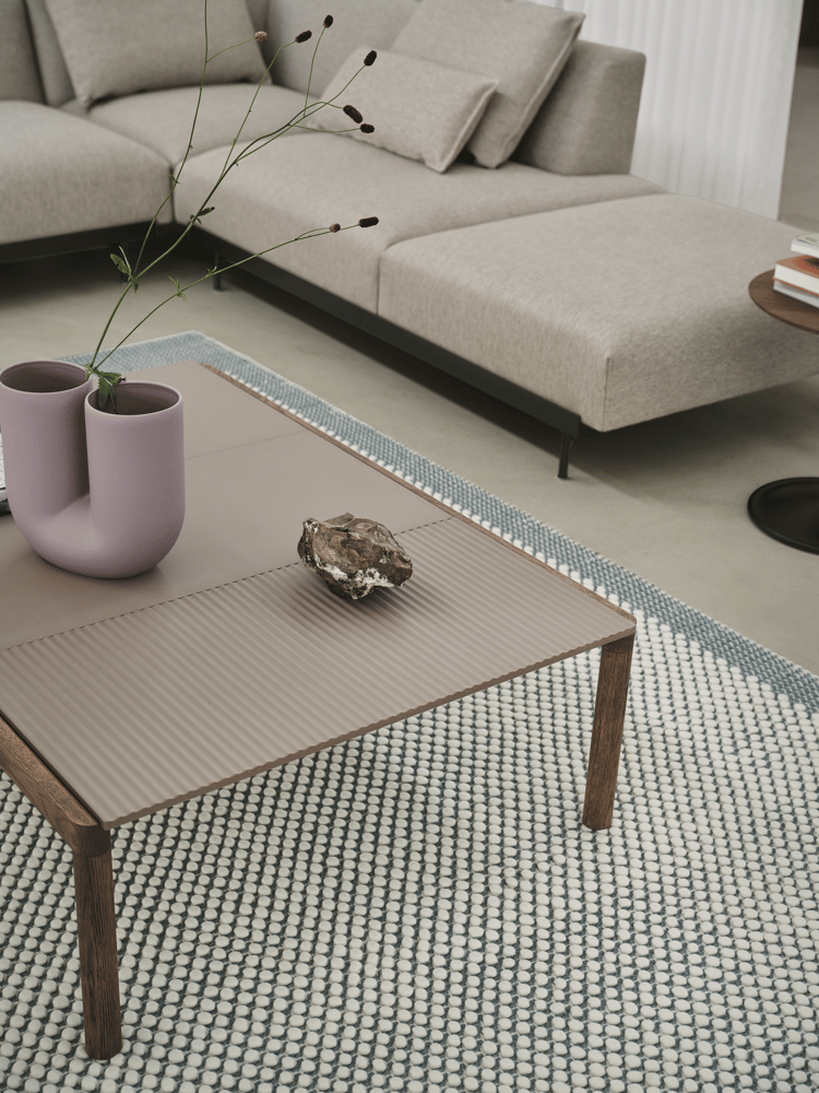 couple-coffee-table-120x84x35-2-plain-1-wavy-taupe-dark-oiled-oak-pebble-kink-pale-blue-in-situ-clay-12-soft-side-smoked-oak-black-muuto-org.png