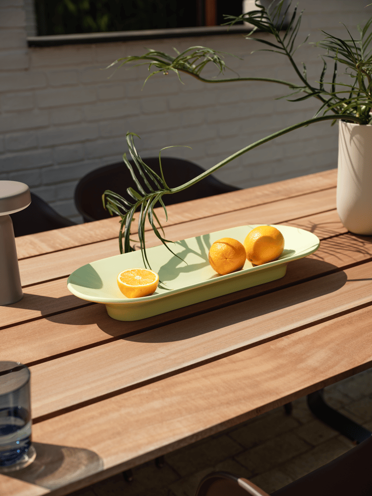 /cdn-cgi/image/width=1500,quality=85,format=auto/globalassets/content-media/images/plp/outdoor/accessories/mere-bowl-light-green-70-70-outdoor-table-sapele-mahogany-fiber-outdoor-armchair-brown-green-ease-taupe-kink-muuto-org.png