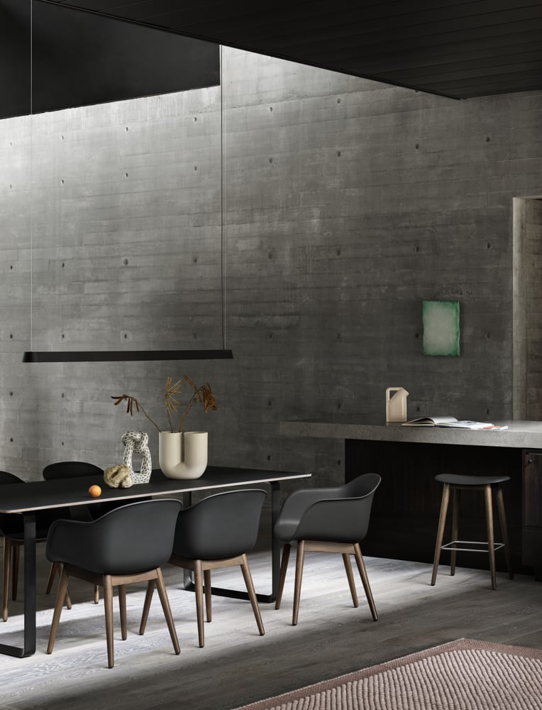 /cdn-cgi/image/width=1500,quality=85,format=auto/globalassets/content-media/images/products/shop-by-family/linear-system/linear-pendant-lamp-169-black-70-70-black-fiber-armchair-fiber-counter-stool-black-stained-dark-brown-muuto-org.png