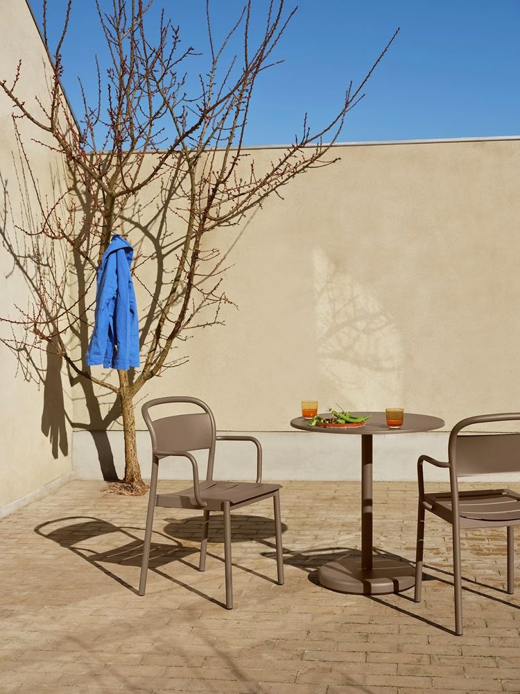 linear-steel-armchair-cafe-table-taupe-raise-glass-burnt-orange-low-res